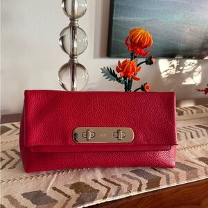 Coach Swagger Clutch Red!! beautiful pebbled leather with chain strap.